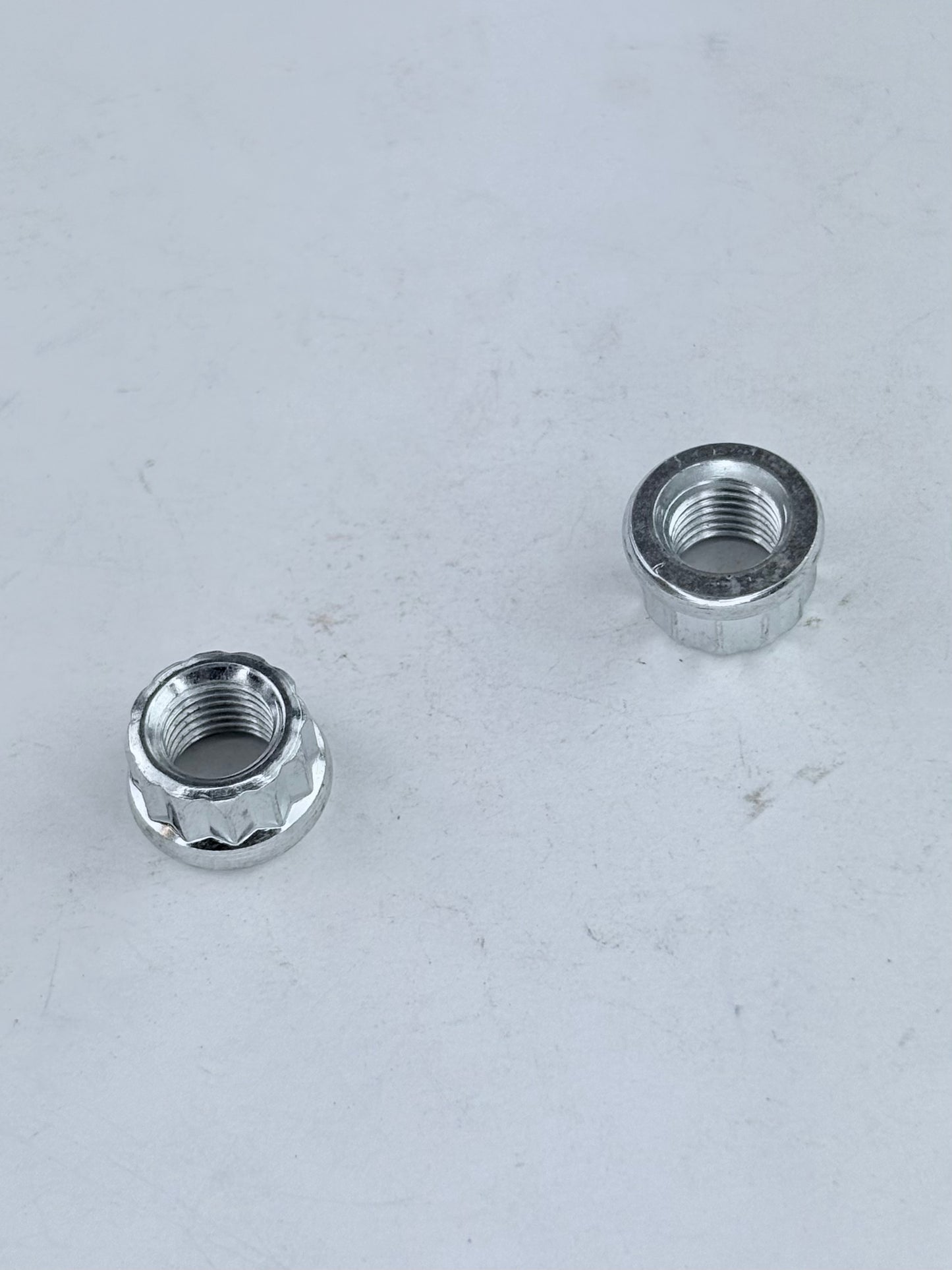 21-0692 - NUT - 3/8-24 - CYL BASE