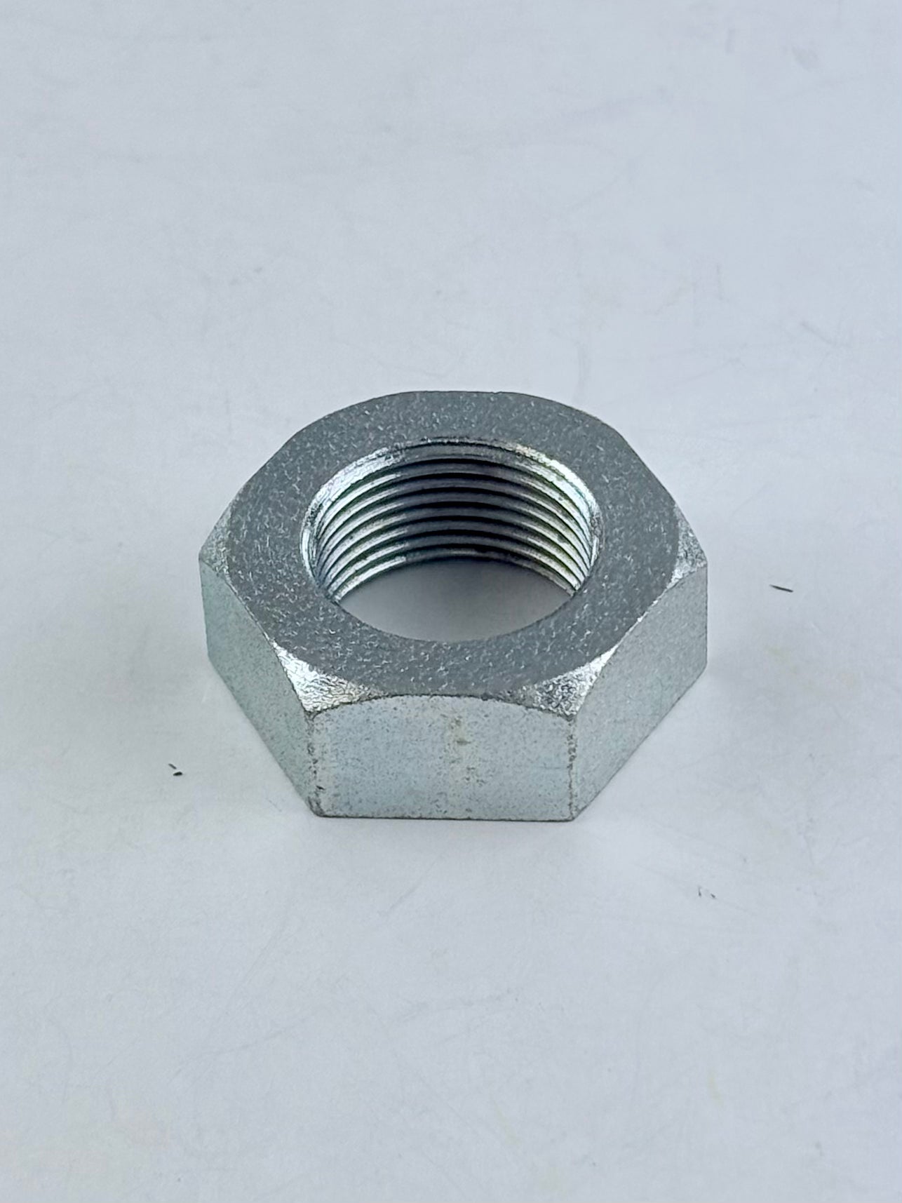 21-0585 - NUT - AXLE - 3/4-20 - 1969-70 - TRIDENT CRANK