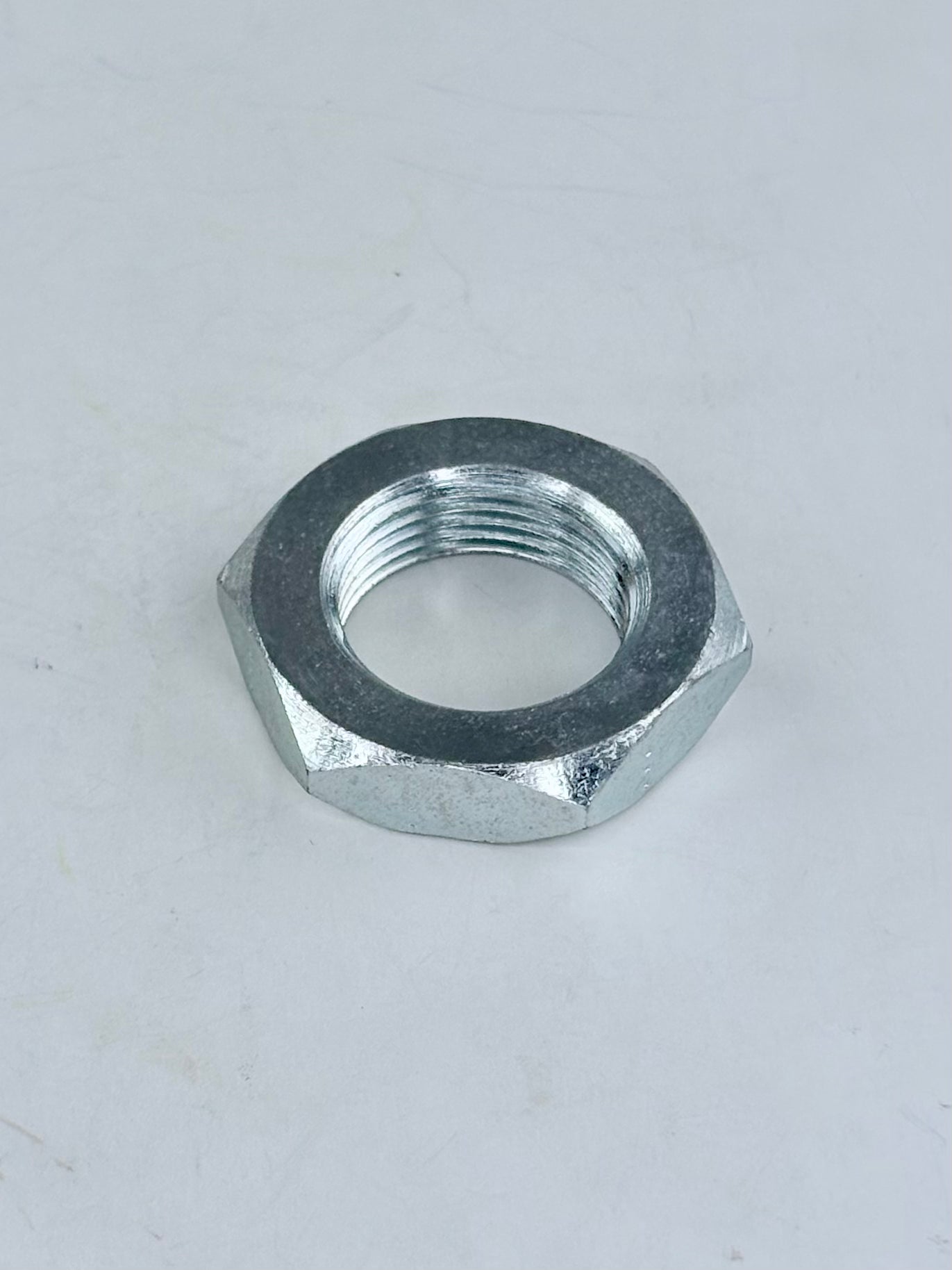 37-1246 - NUT - AXLE - FRONT WHEEL - 3/4-20