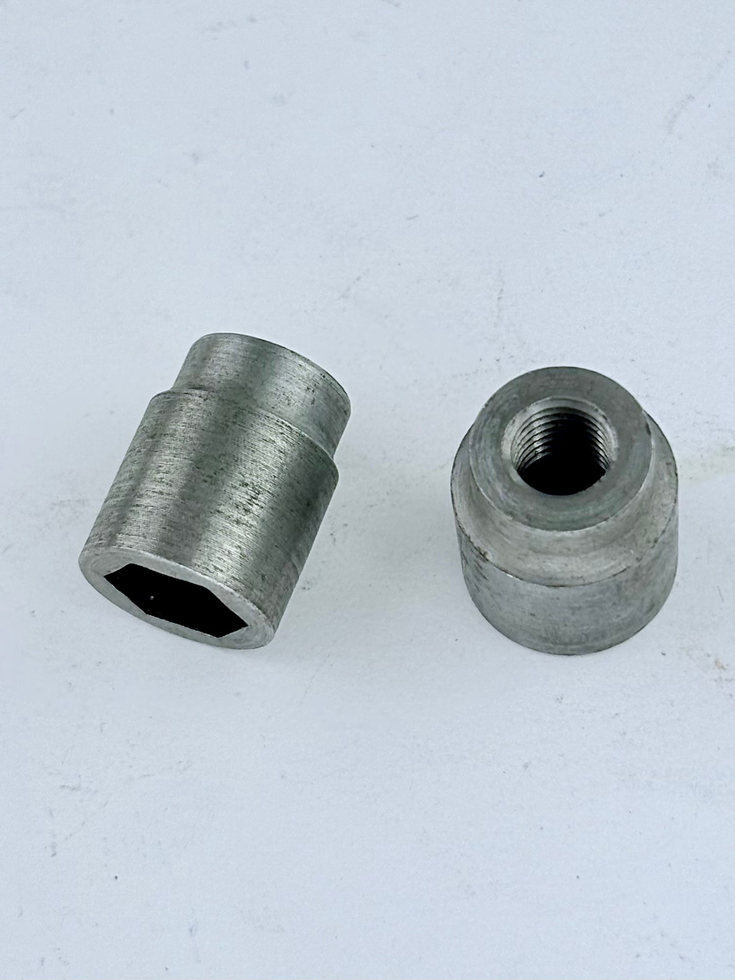 21-7092 - NUT - 5/16"-24 - SOCKET TYPE - CYLINDER HEAD - 750 TWINS