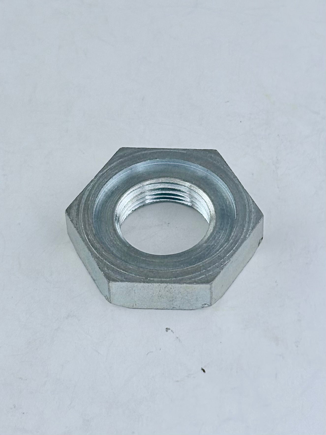 37-1093 - NUT - FRONT WHEEL - CUB - 5/8-20