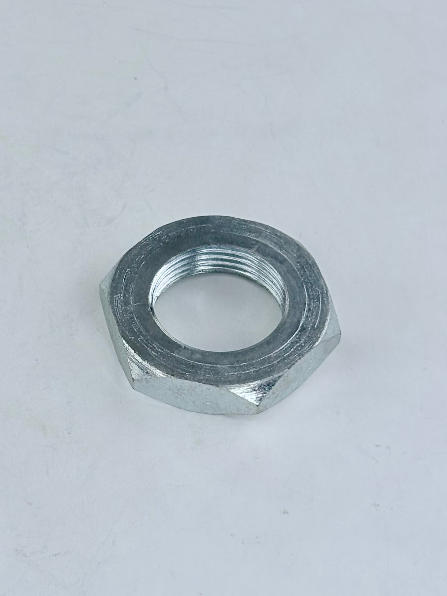 37-1246 - NUT - AXLE - FRONT WHEEL - 3/4-20