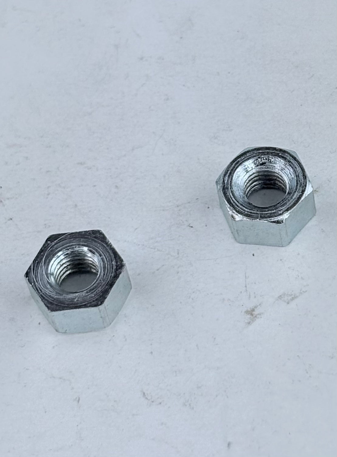 57-2706 - NUT - 1/4-26 CEI - THICK