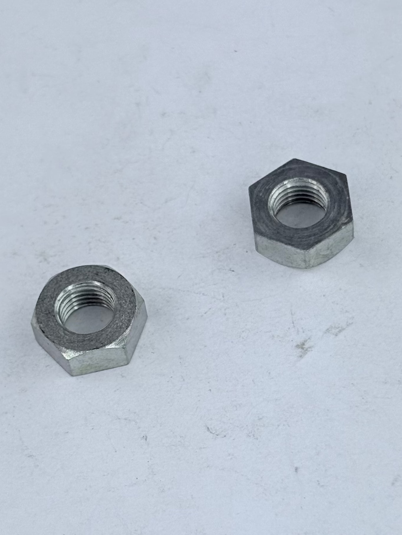 70-8133 - NUT - 5/16-26 - THIN