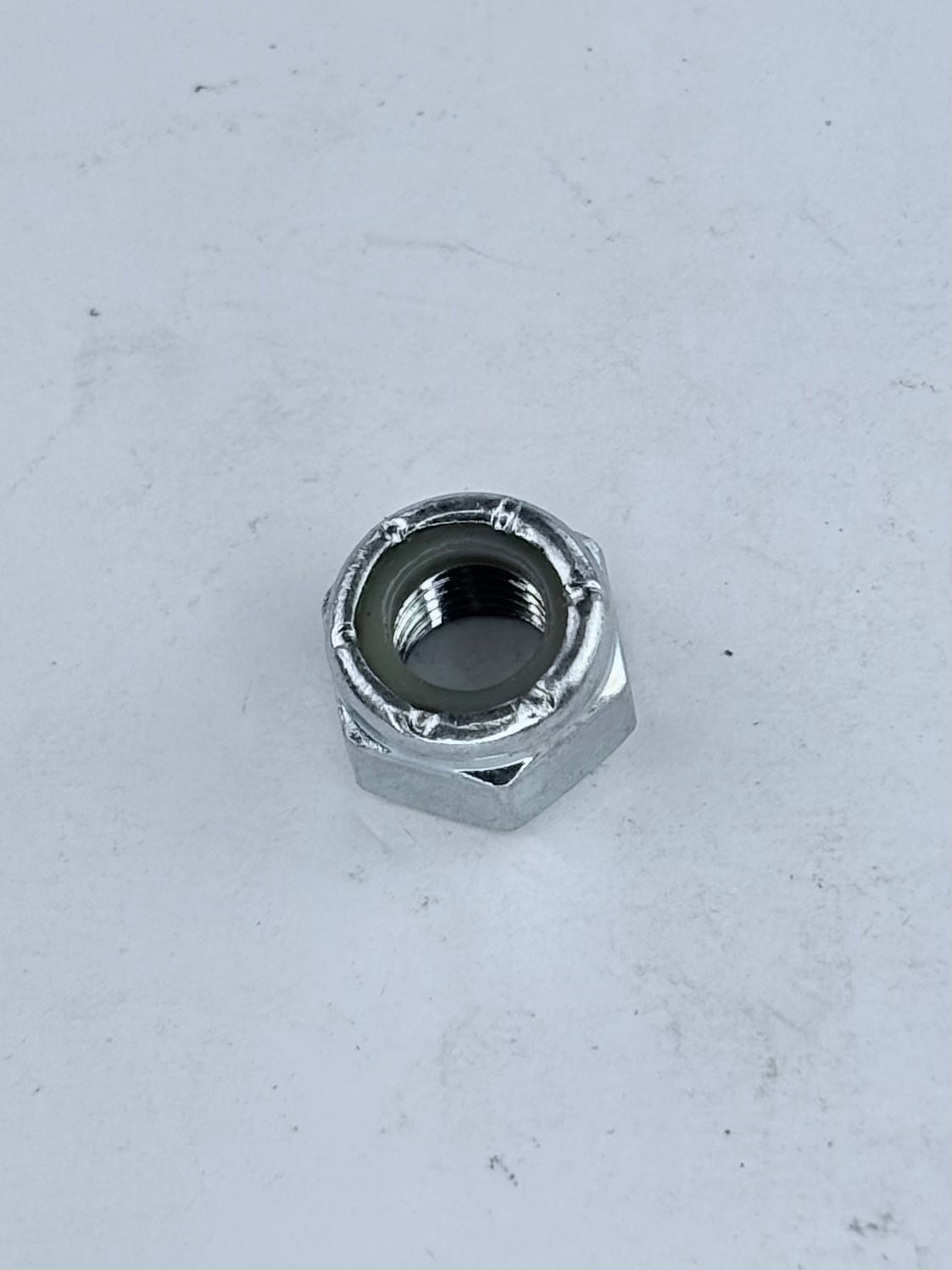 70-8137 - NUT - 5/16"-26 - NYLOC