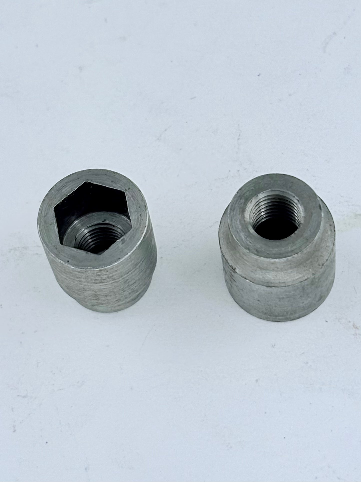 21-7092 - NUT - 5/16"-24 - SOCKET TYPE - CYLINDER HEAD - 750 TWINS