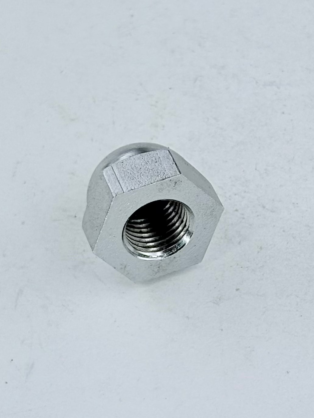 21-0550 - NUT - 3/8-24 - DOMED - ROCKER SPINDLE - CHROME