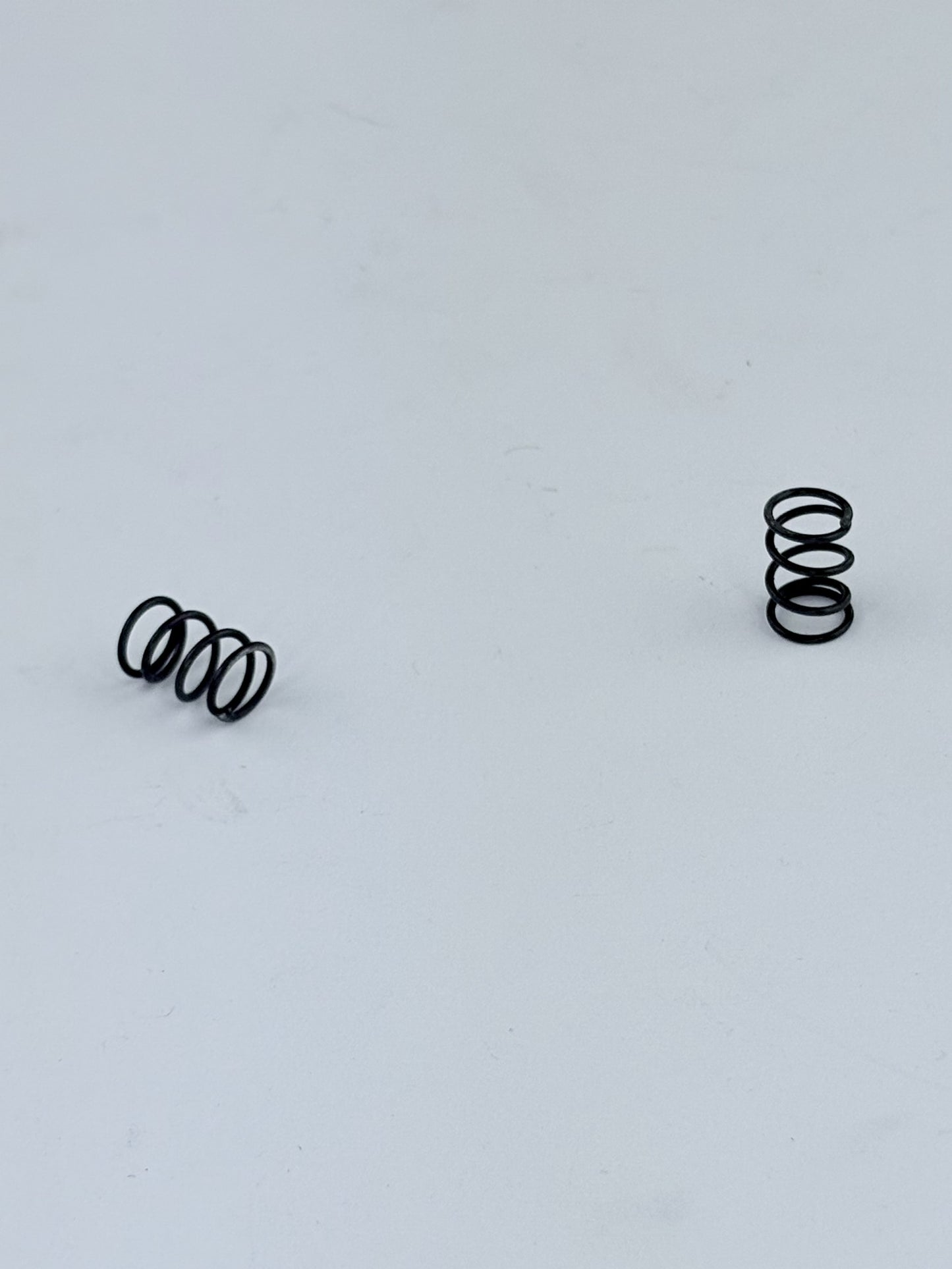 57-0497 - CHAIN OILER ADJUSTER SPRING - PRE-UNIT PRIMARY COVER