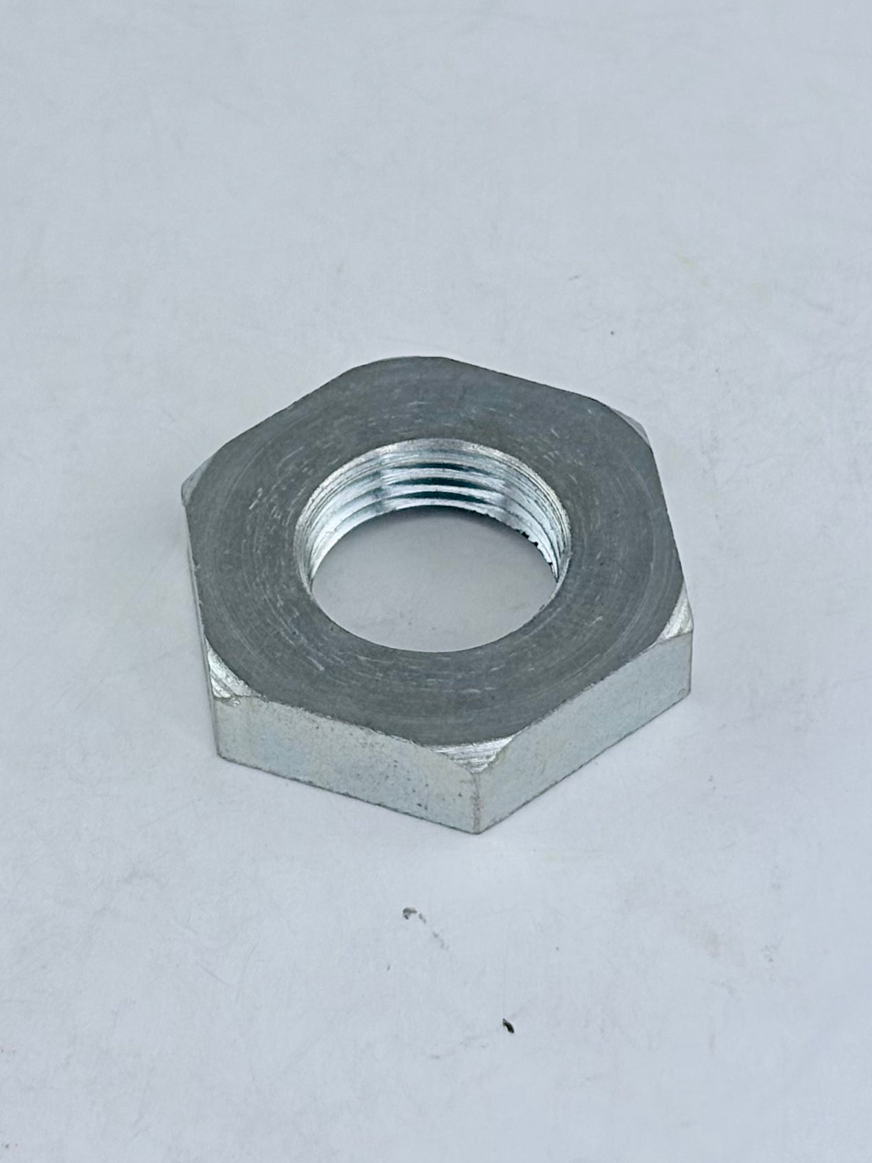 37-1093 - NUT - FRONT WHEEL - CUB - 5/8-20